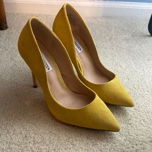 Yellow suede pumps